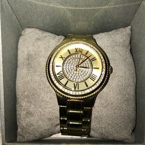 Guess gold watch with stones.